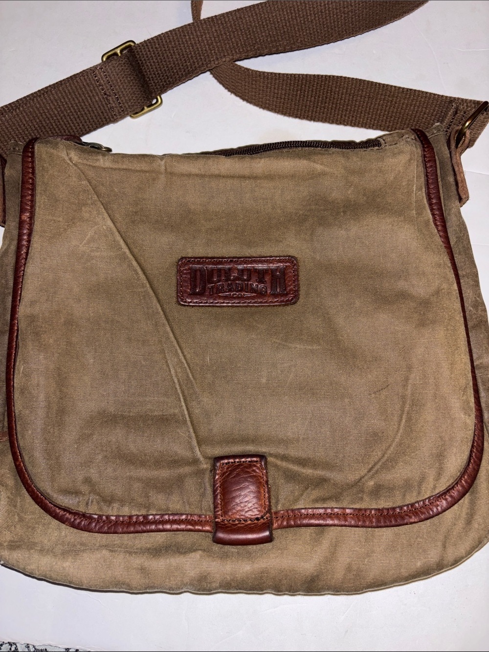 DELUTH TRADING COMPANY BROWN LEATHER WITH SOFT BROWN PRELOVED OIL CLOTH DESIGN